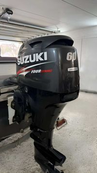 купить 4х-тактный лодочный мотор SUZUKI DF60ATL Б/У в Москве - фото 